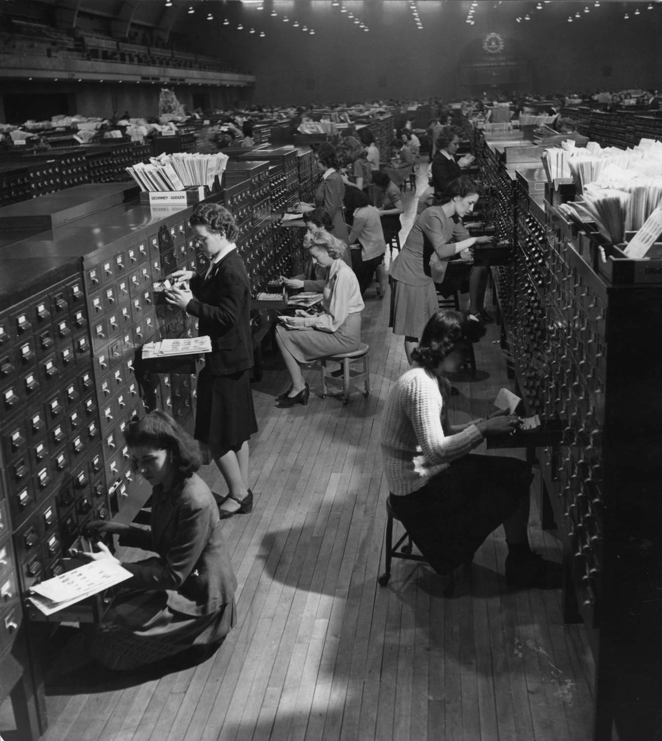 Inside the vast FBI halls girls work through a million fingerprints a year stored in filing cabinets in the Identification Division of the Federal Bureau of Investigation (FBI) located at the DC Armory in Washington DC, United States. Civil files are never consulted in crime cases. 4 February 1944